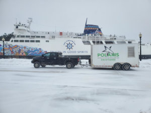 The Polaris truck is seen sitting in front of the iconic Chi-Cheemaun ferry in Owen Sound, Ontario